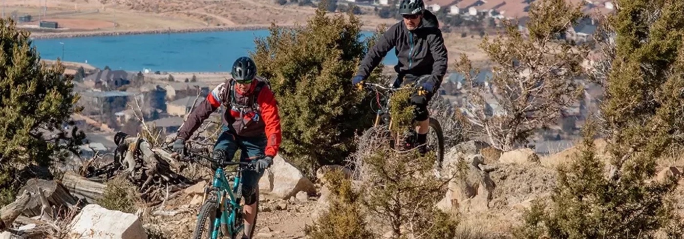 Team members riding cedar city, utah trails on mountain bikes