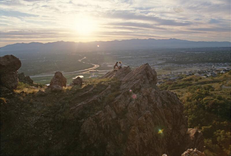 "A hiker and their dog enjoying the view from the BST"