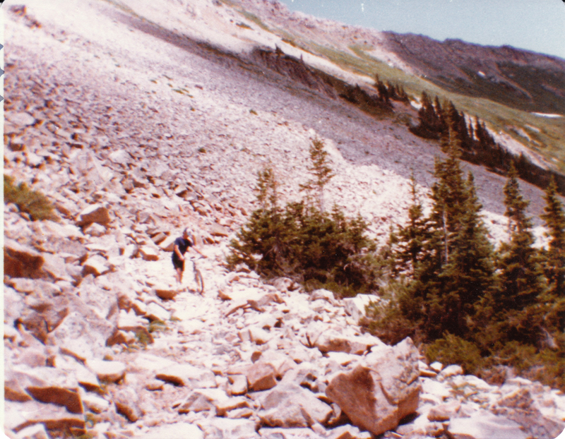 "Chris Haas hikes a bike on Conundrum Trail"