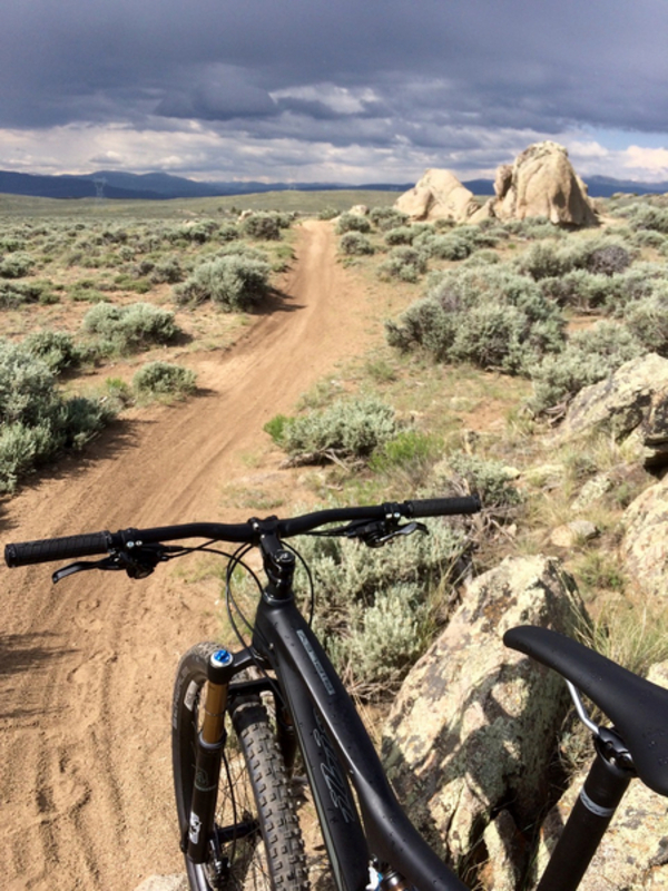 "Full suspension bike on the trail"