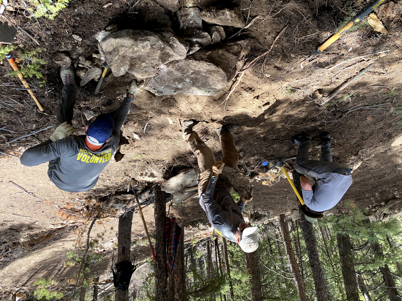 "Trail builders moving rocks in Maryland Mountain"