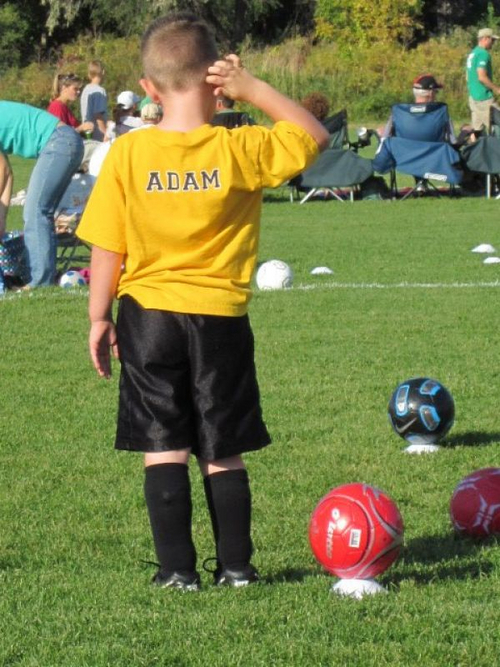 "Adam from behind at soccer practice"