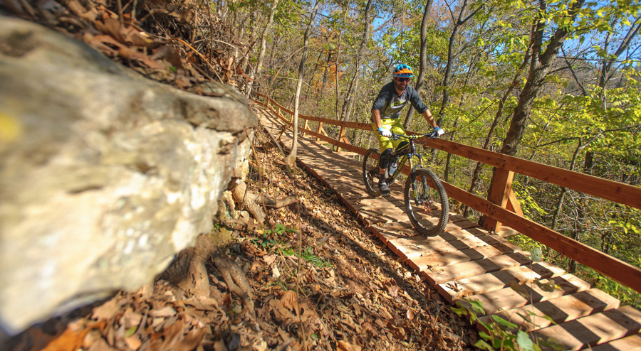 Person riding bike in Bentonville, attending Trail Labs: Foundations