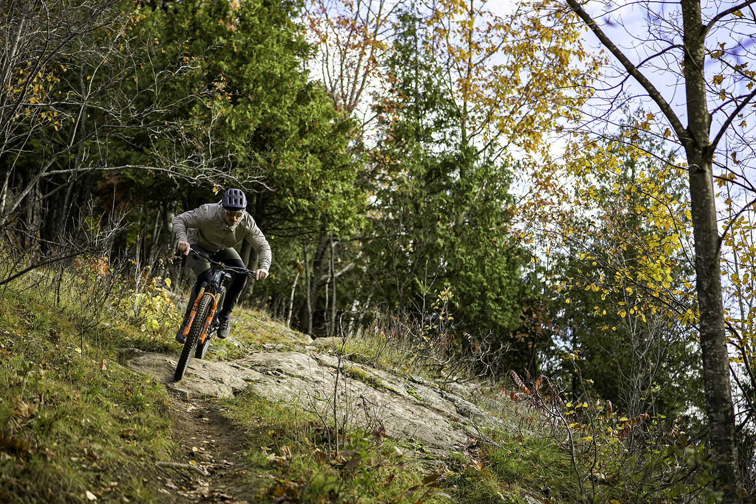 "Brice Shirbach coasting through a rocky section of trail."