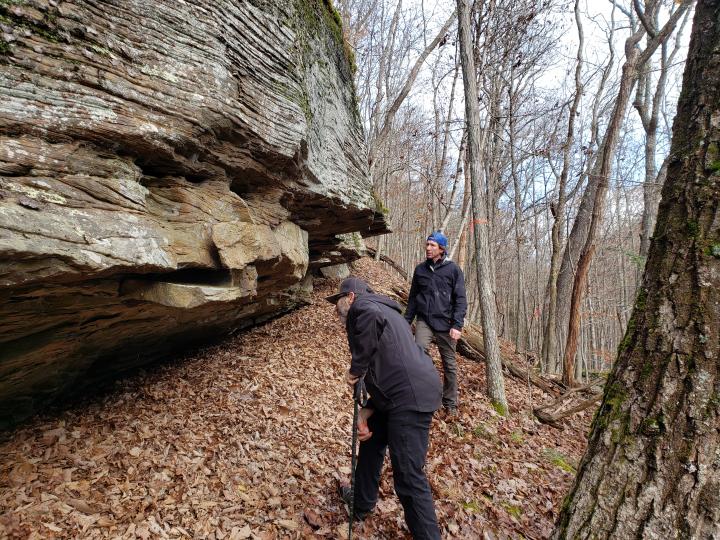 Rich Edwards, rock formation, forest, flagging trail, Trail Solutions