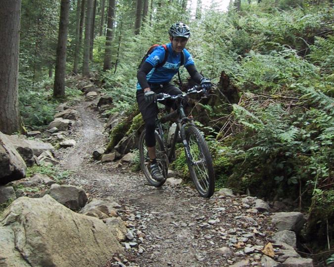 Rich Edwards, IMBA Trail Solutions, UK, mountain bike, mountain biker, rocky trail, forest