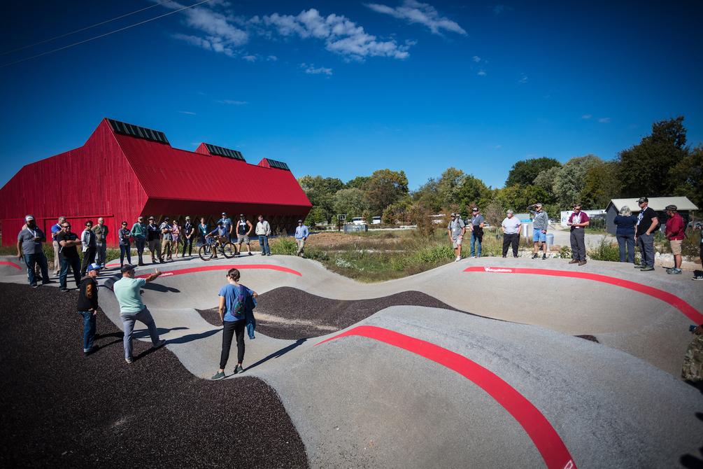 Group attending a Trail Labs: Foundations, learning at a local pumptrack