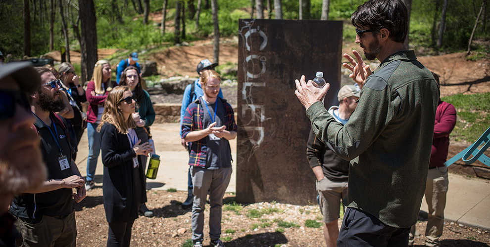 Scott Dirksen, Coler Mountain Bike Preserve Program Manager, guides the participants through the various features at the preserve.