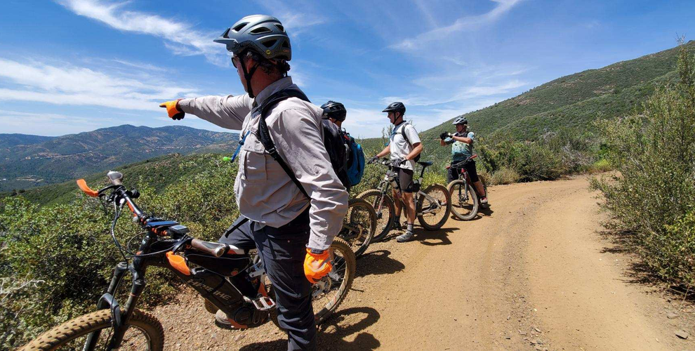 eMTBers biking in Arizona