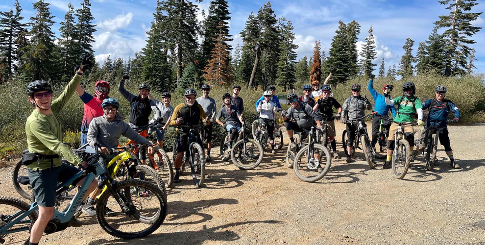 Group of mountain bikers posing before a ride in Orange County, California