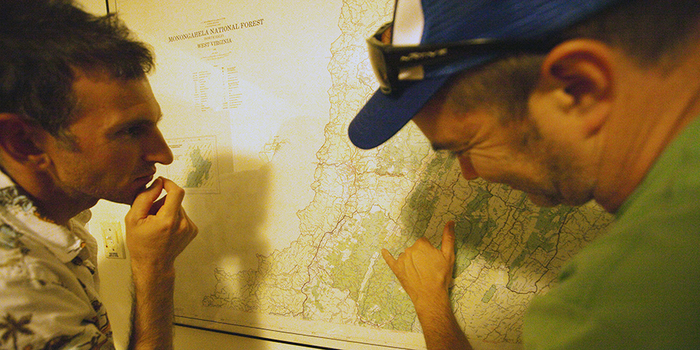 IMBA staffers teaching and riding.