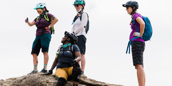 Women riders chatting during a ride.