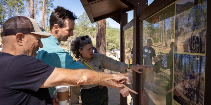 National Forest and IMBA Trail Labs attendees review a trail map.
