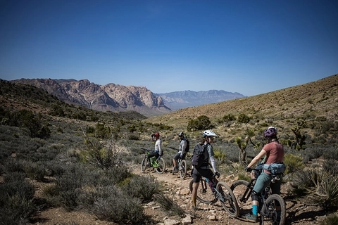Mountain bikers pause during a group ride in Las Vegas, NV.