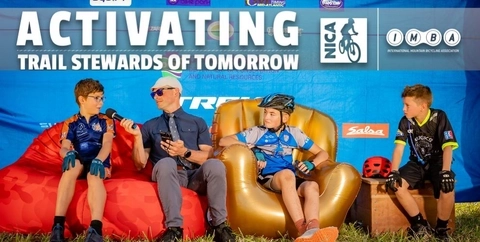 Four NICA athletes sitting on interview couches talking bikes!
