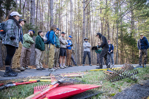 Joey Klein leads instruction on tool use at the trailhead in Chattanooga, TN.