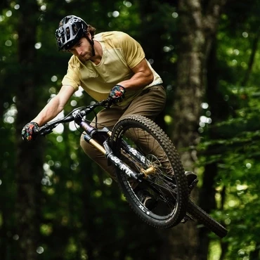 Matt Brabender, IMBA Trail Solutions Planner riding a mountain bike