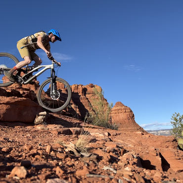 Ben Raiche, IMBA Trail Solutions builder riding bike