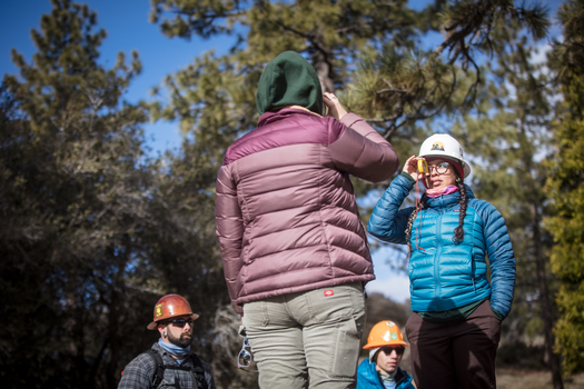 Participants test clinometers during the Angeles National Forest trail care workshop.