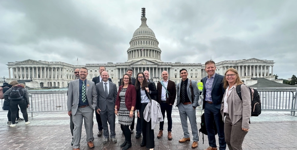 A group of IMBA representatives gather in front of the Capitol building in Washington, D.C.